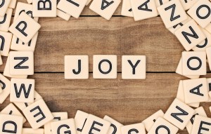 Joy spelled out in tan tile letters